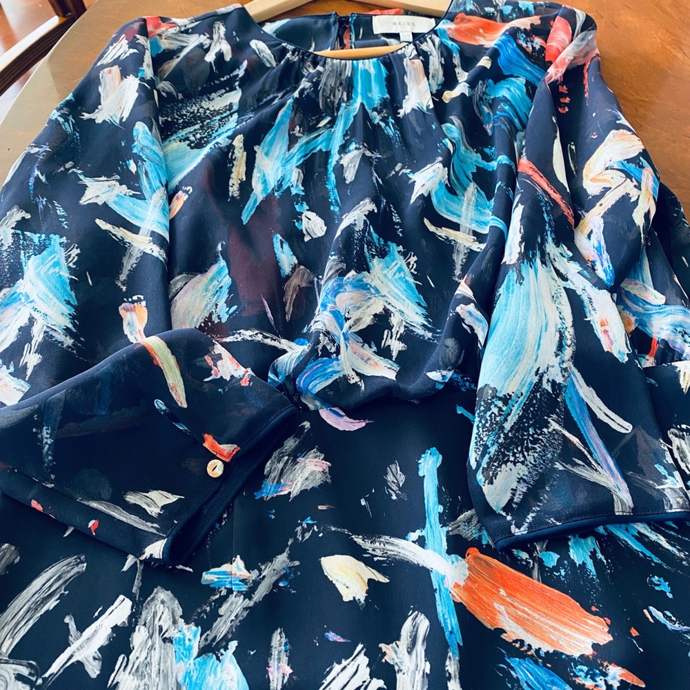 Beautiful blue with orange and white cocktail dress